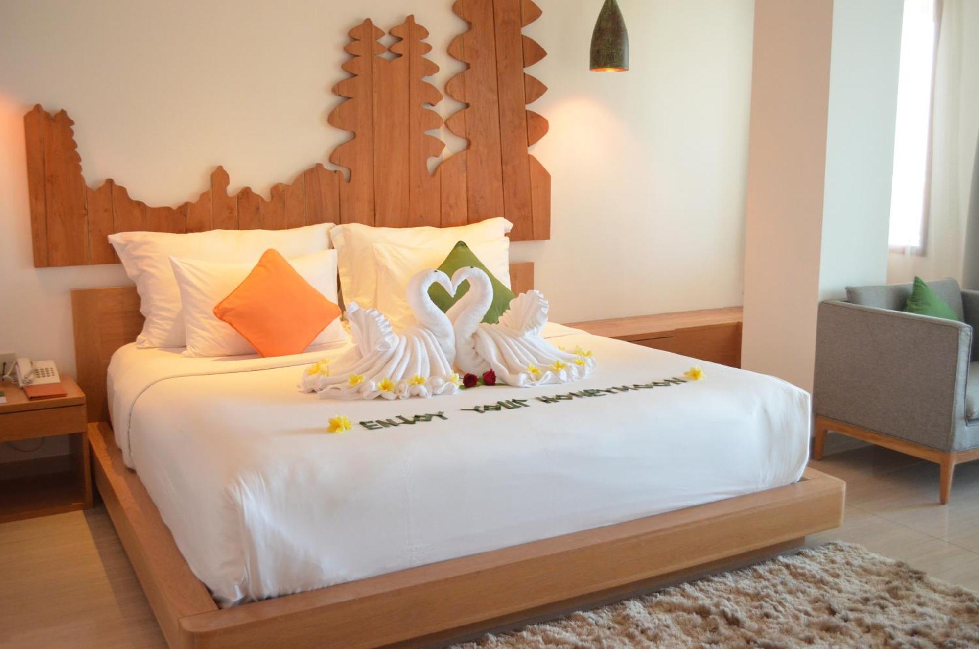 Hotel Nikko Bali Benoa Beach Nusa Dua  Eksteriør bilde A bed with a towel art